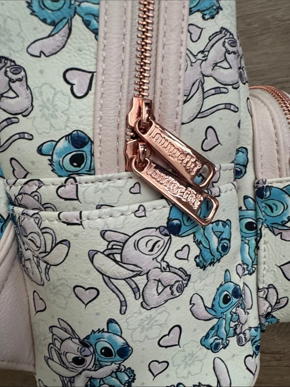 Loungefly Cream Mini Backpack with Blue Stitch Print and Pink Accents